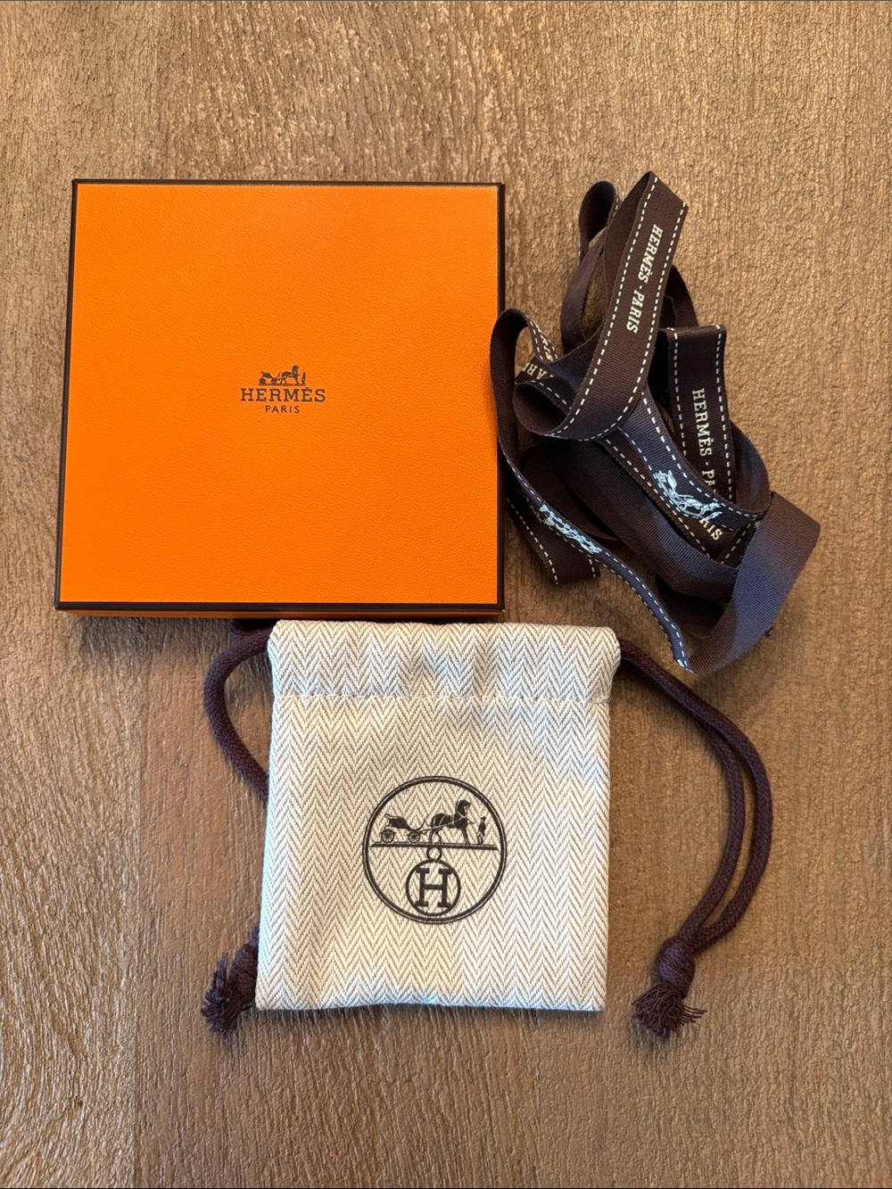 Hermes Small Drawstring Pouch in Natural with Brown Trim, original box/ribbon.